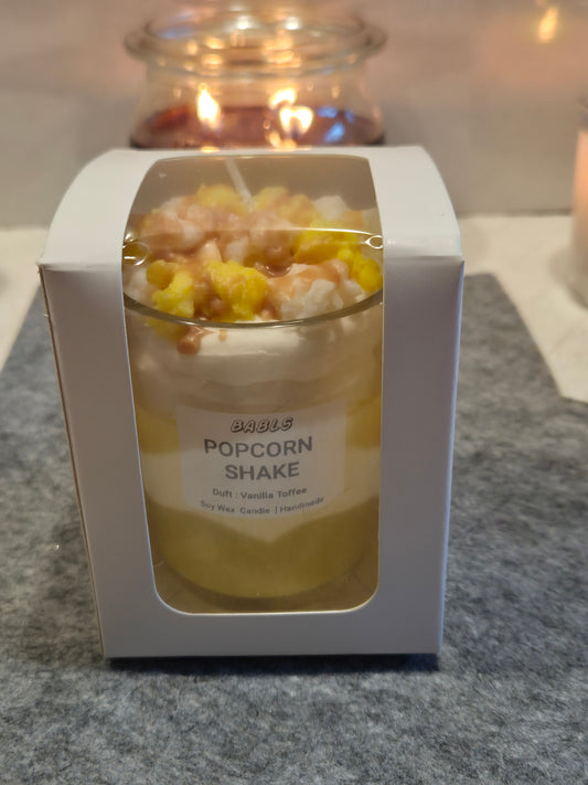 Popcorn Kerze Nahaufnahme beige Kino-Feeling 